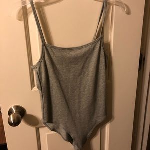 Grey body suit